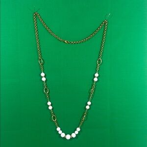 Elegant Gold and White Necklace